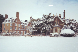 building and ground covered in snow