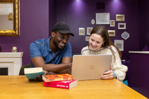 Students using a laptop