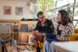 Students sat in a record shop cafe in Exeter