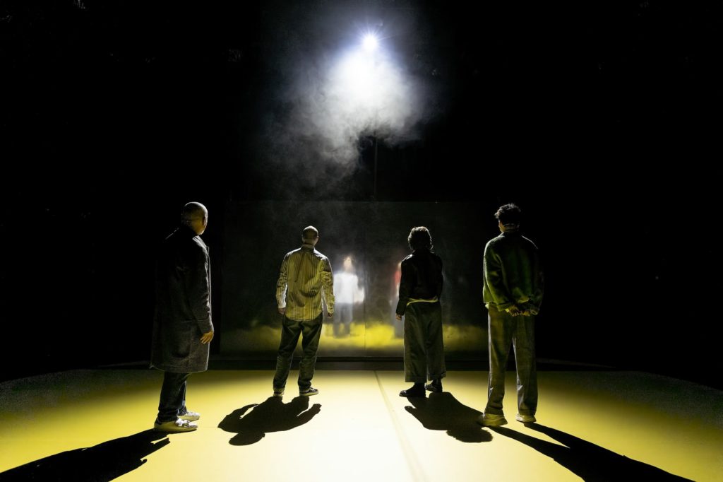 Closing scene -- all four characters face the mirror before the light is switched off