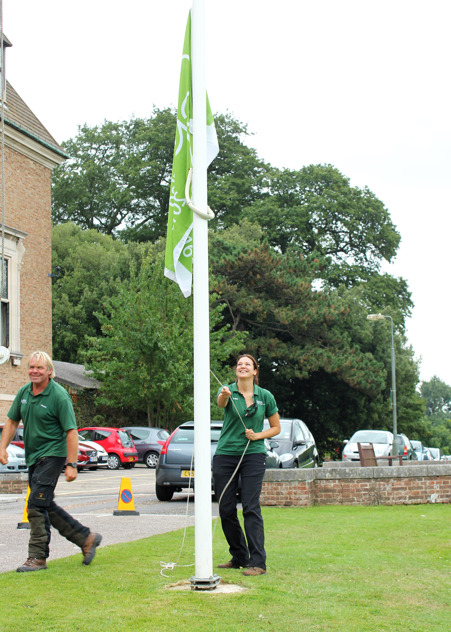 Kate raises the Green Flag (this was take two, after we had turned the flag the right way around - oops!)