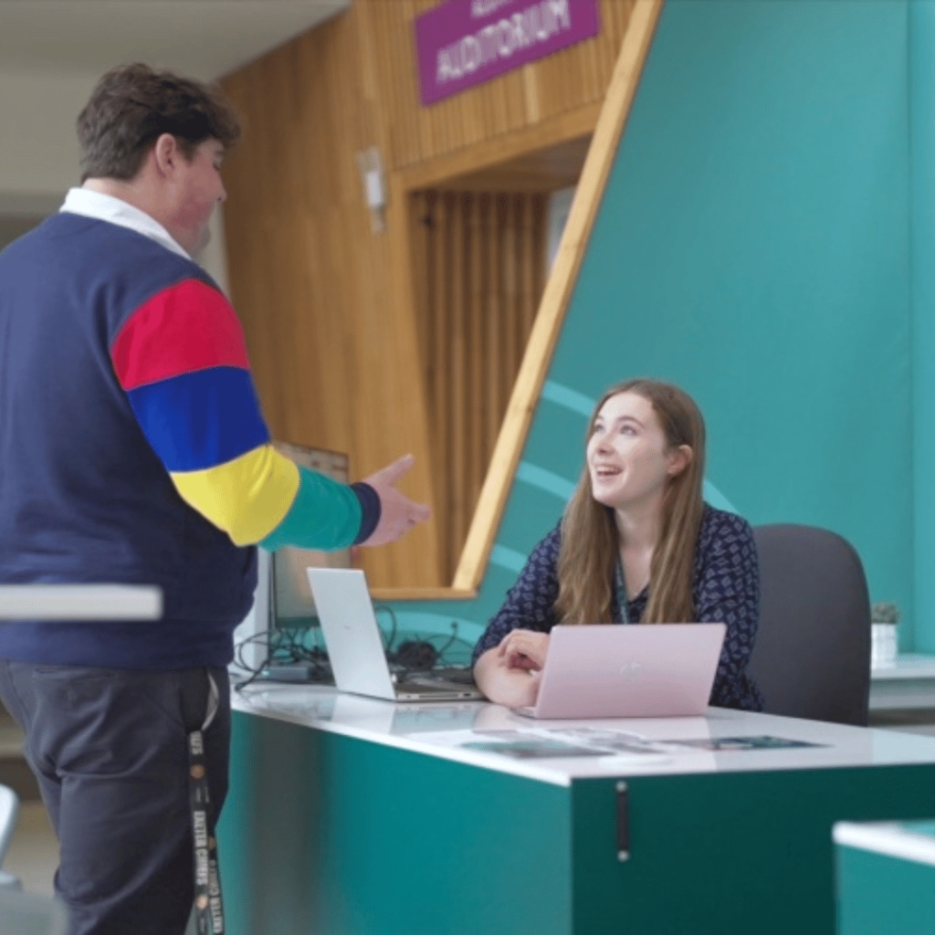 A student being served at the Digital Hub on Streatham campus. 