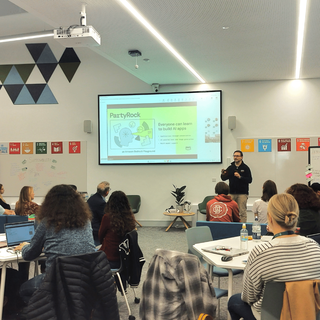 AWS team member presenting the PartyRock AI tool to a group. 