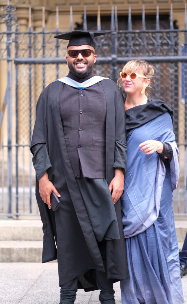 Wribhu Ghosh and his wife at his graduation ceremony in 2020.