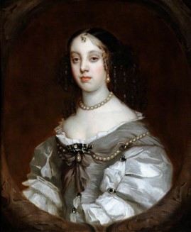 A painted portrait of Catherine De Braganza. She is wearing a silk dress with white sleeves, and blue bodice.