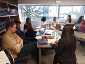 Students and alumni gathered around tables in the Moot Court for the Canadian Law Careers Development Event.