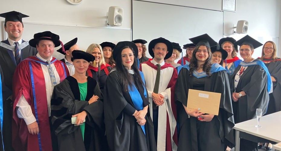 A group of exeter Law School academics and students in graduation robes