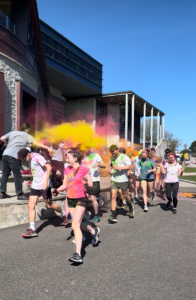 Students participating in a colour run fundraiser