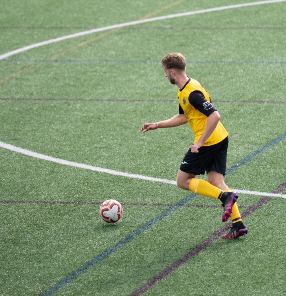 Student playing football