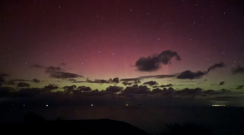 Looking out at the Northern lights from the North coast of Jersey (CI) 