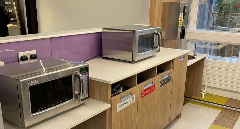 Student kitchenette with two microwaves, a water fountain and hot water dispenser