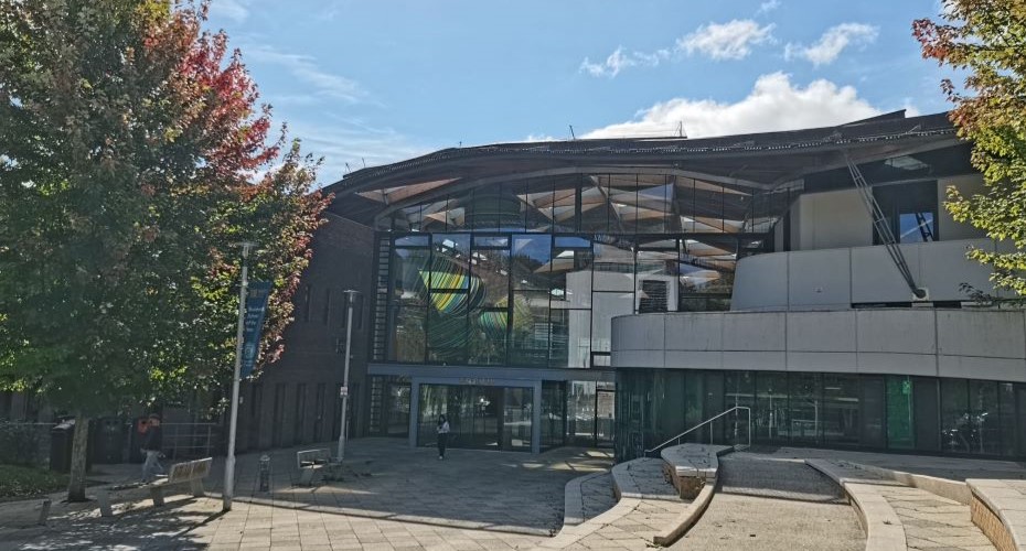 The glass front of the Forum building