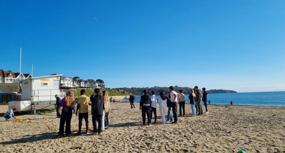 Group of students on a beach