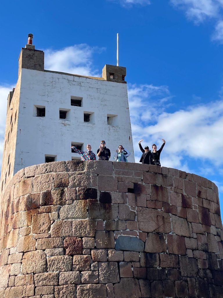 Some of the JICAS students waving from Seymour tower, Jersey.
