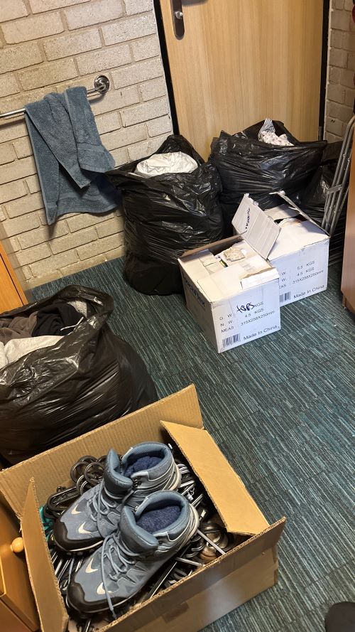 Packing boxes on the floor of student accommodation