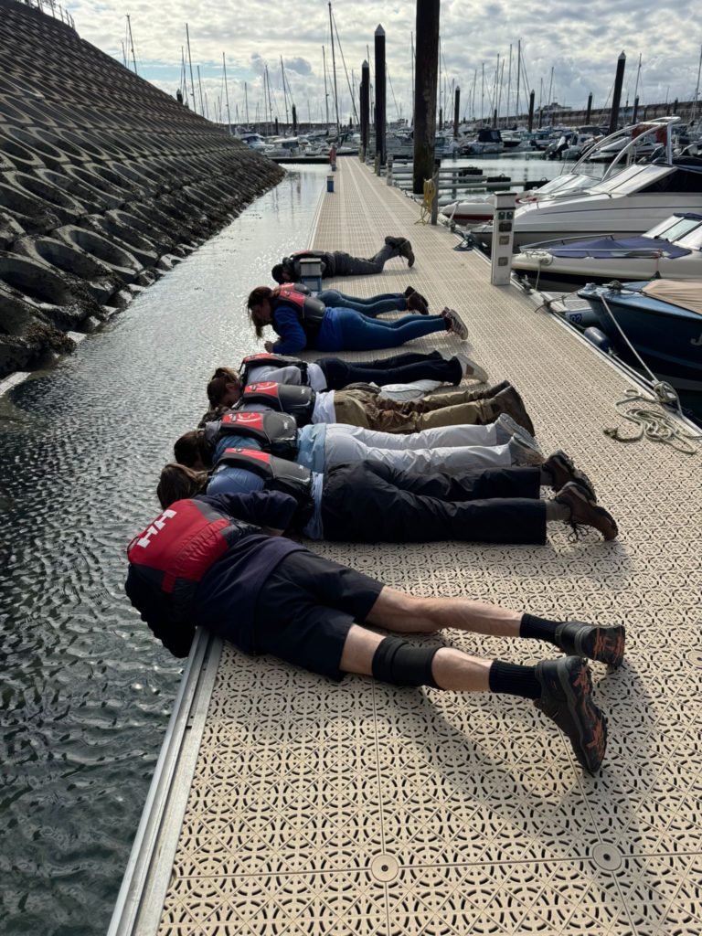 JICAS students back in September looking at the marine biodiversity on the bottom of the pontoons in Elizabeth Marina, Jersey