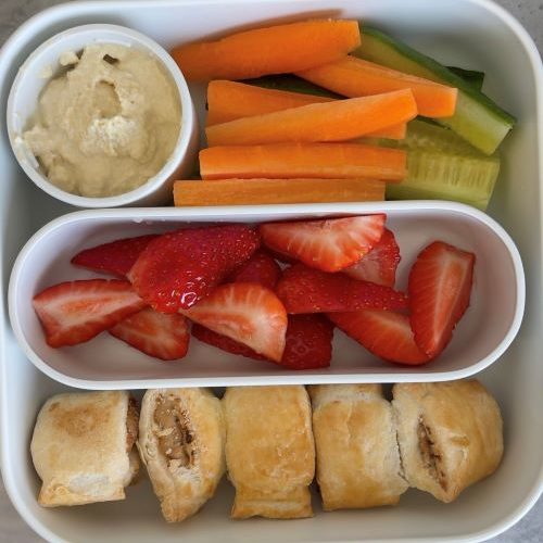 A lunchbox full of colourful vegan snacks