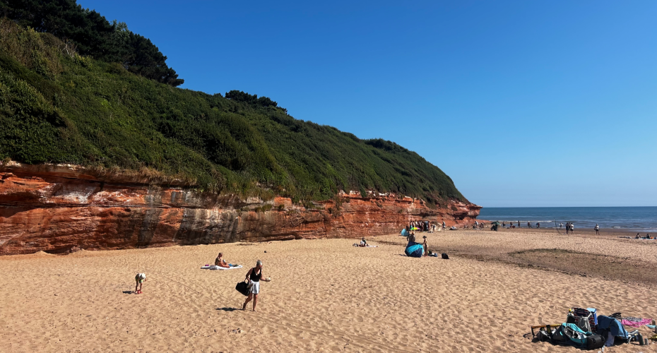 An empty sandy beach on a sunny day