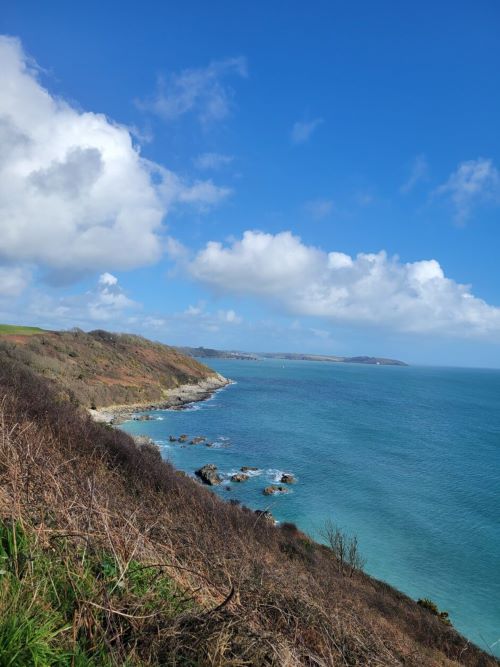 Bight blue sea and the Cornish coast