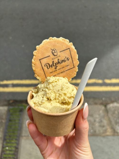 Ice cream with a spoon and a wafer