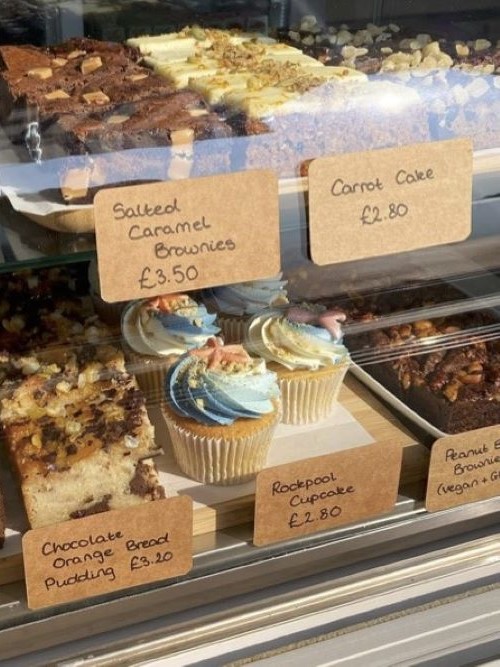 A cafe display of cakes