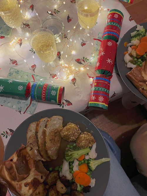 A festive roast dinner with all the trimmings and Christmas crackers