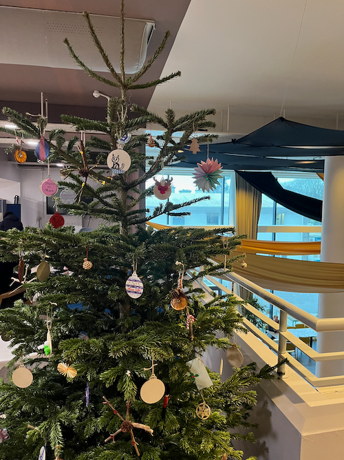 A large christmas tree in the University of Exeter's Exchange Building, at the Penryn Campus