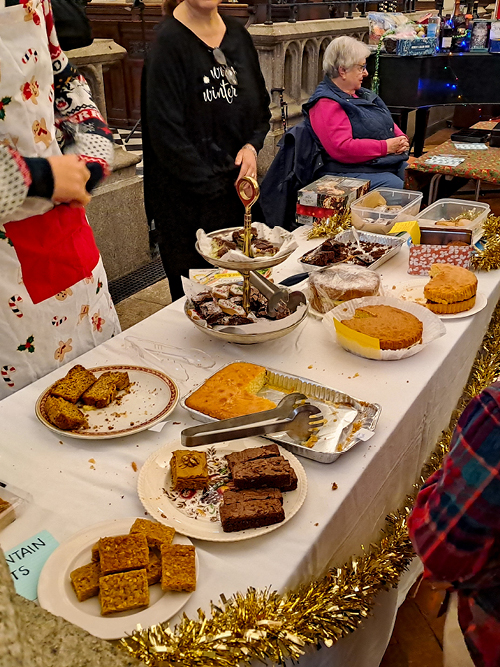 Food stalls with at a festive event showing cakes and traybakes