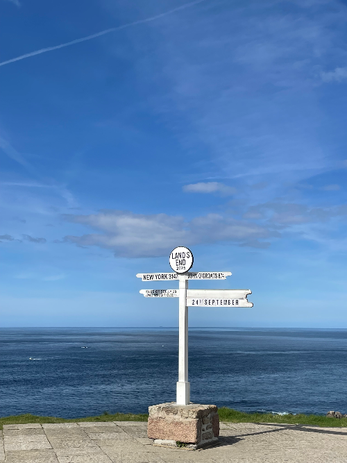 Land's End sign on the edge of a cliff