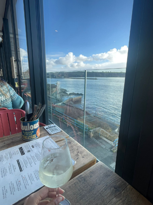 View out of a cafe window over an estuary