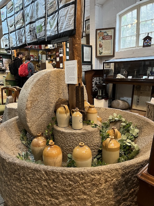 The inside of Helston Museum of Cornish Life, with some historic cider mill equipment