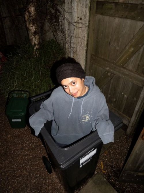 Me sat in a rubbish bin. Dont worry, its a brand new one and vry clean!