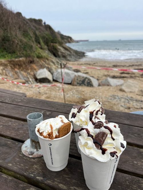 Hot chocolates with all the toppings at Maenoporth Beach Cafe.