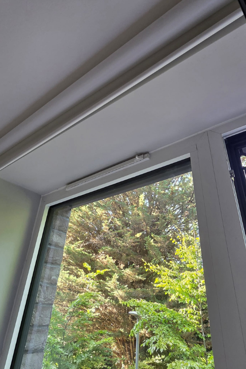 Useful window vents at the top of a dorm window to help air circulation