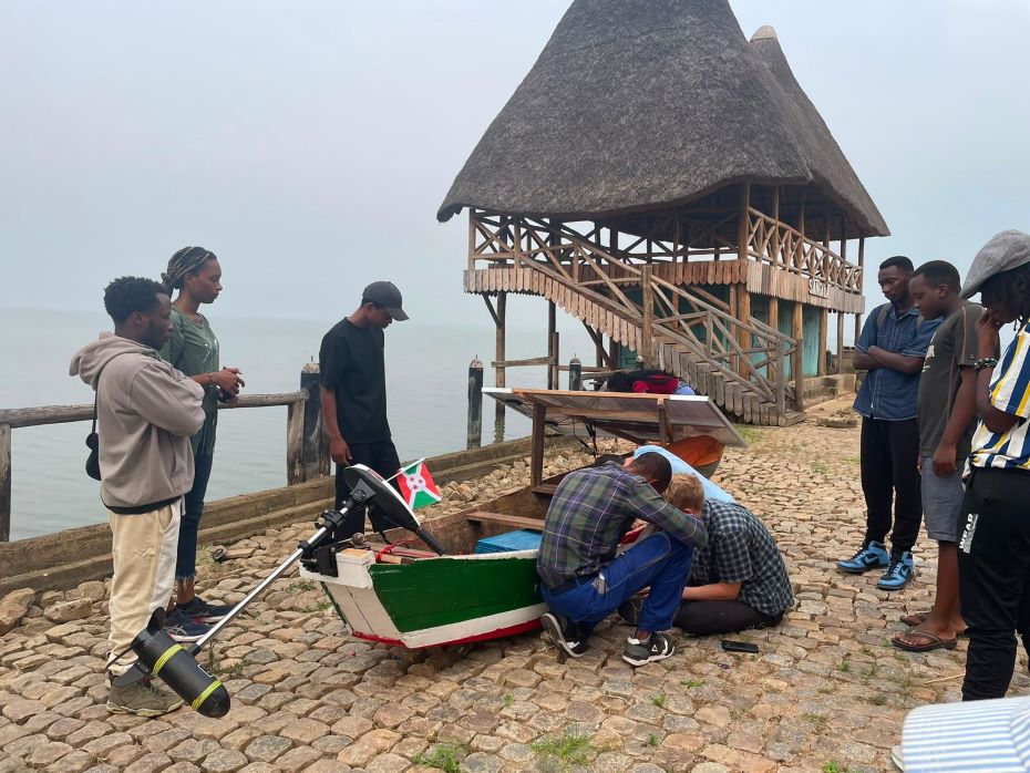 Group of people working on the boat in Burundi