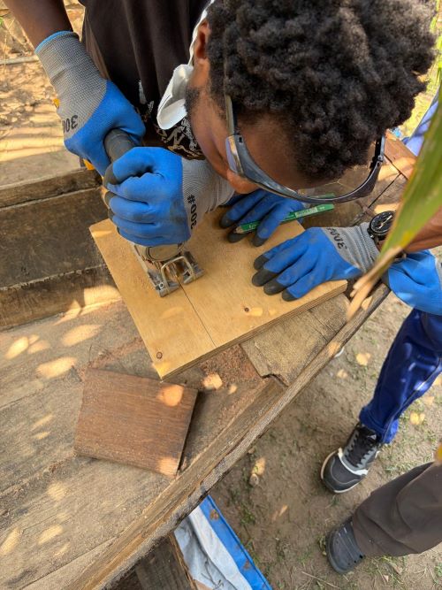 Local engineer working on the boat in Burundi