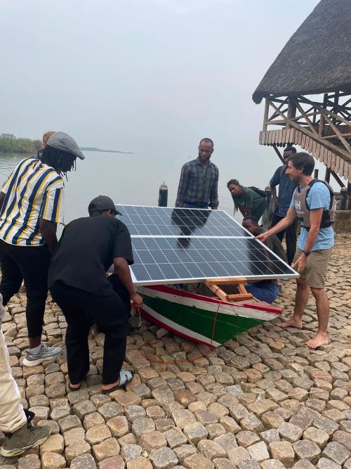 Adding solar panels to the boat in Burundi